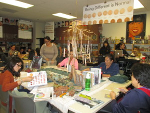 Cynthia, Astrid and Silvana support the color mixing.
